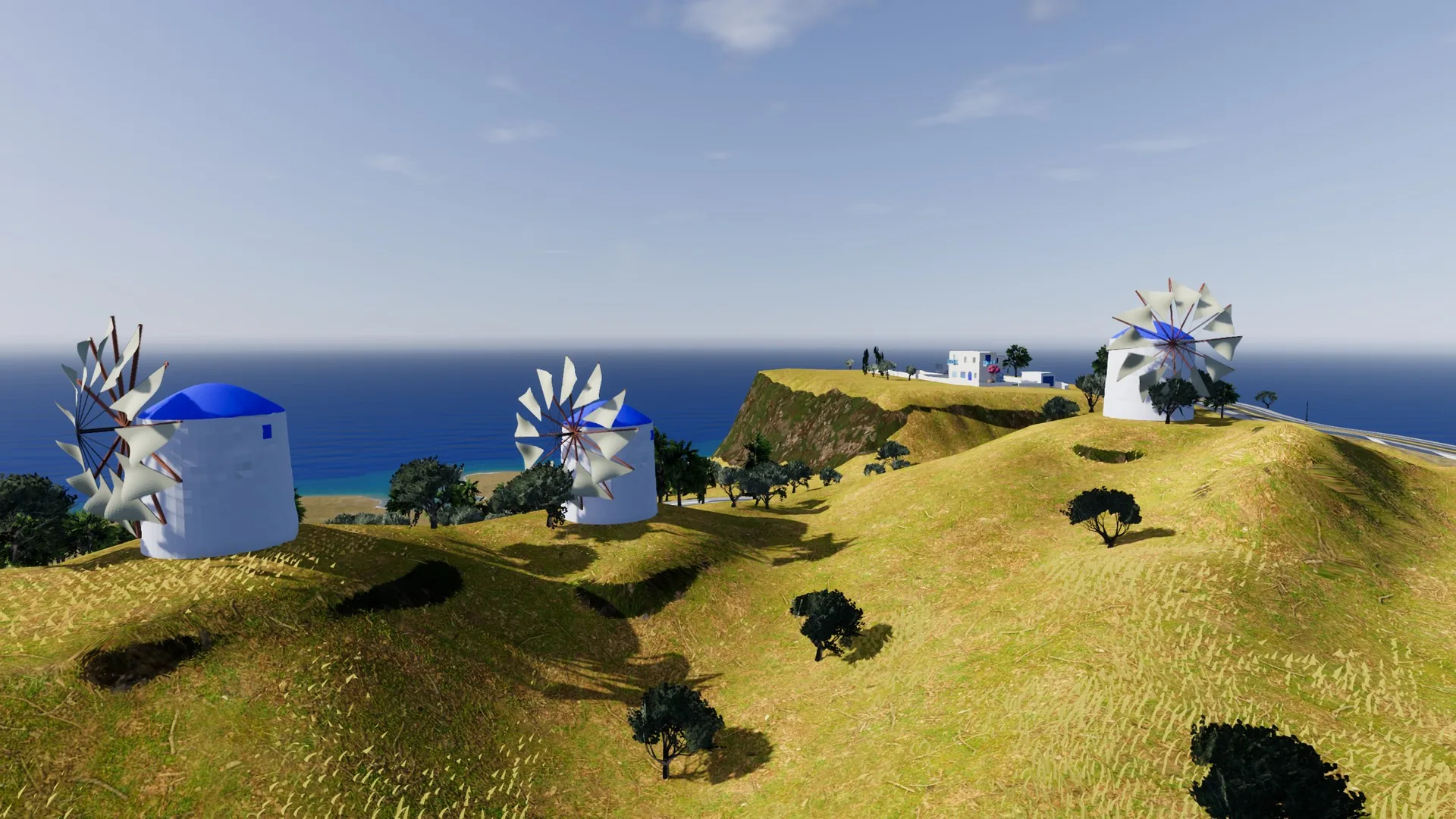 Three whitewashed windmills on a grassy ridge above the sea