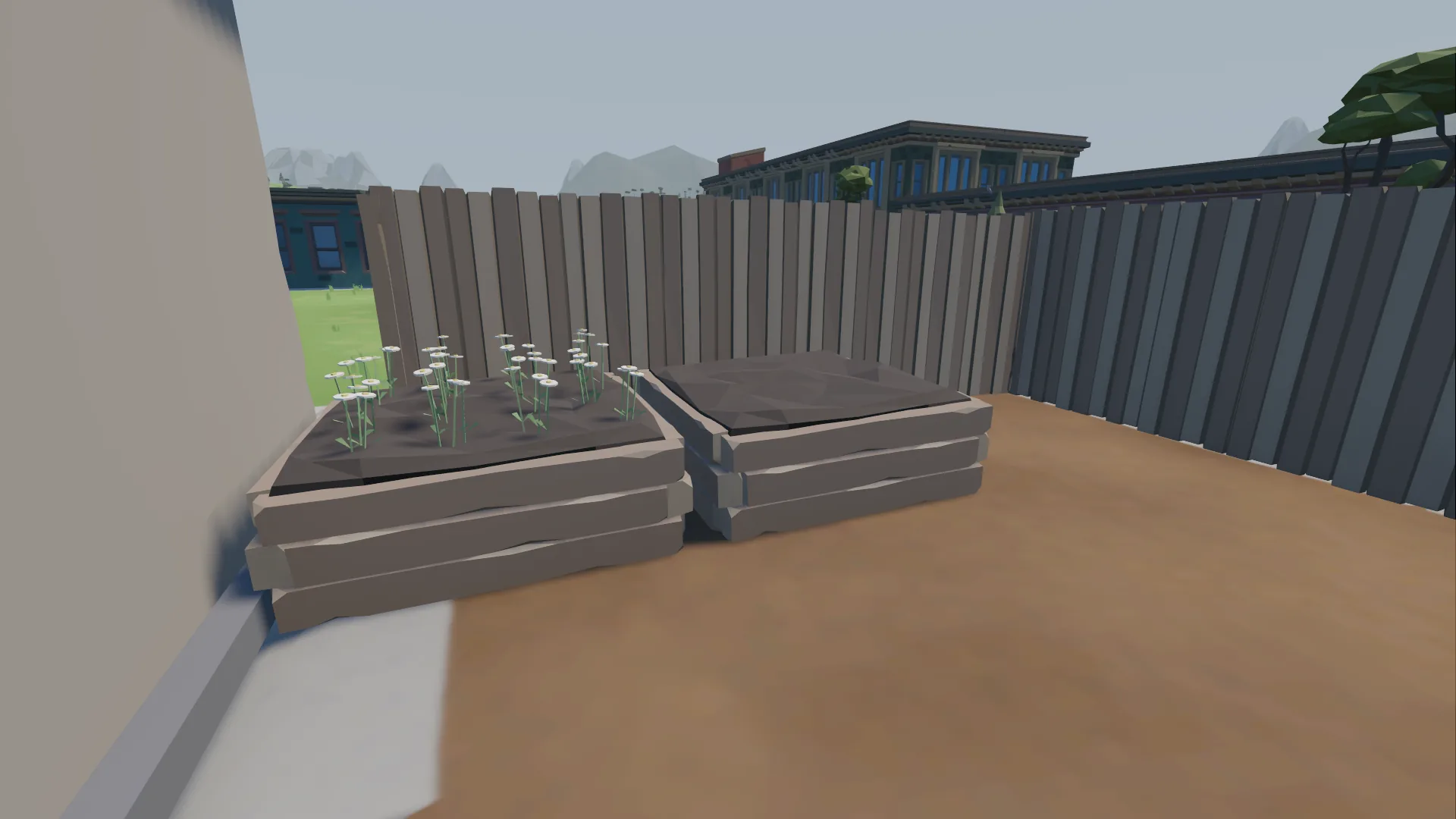 Raised garden beds with young flowers in the florist's fenced rear yard